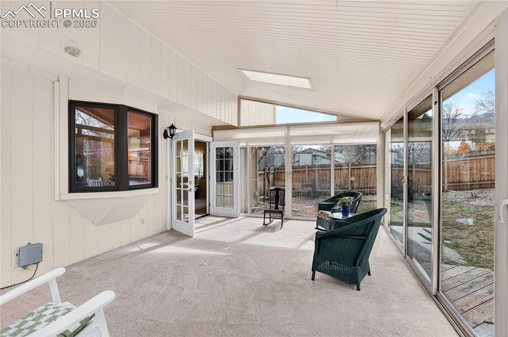 Image 12 of 37: Beautiful 3-season sunroom! Notice the french doors which both open!
