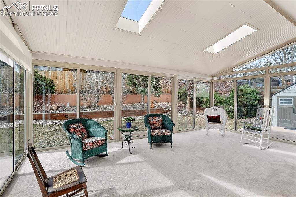 Image 14 of 37: Full length glass panels will make you feel like you are outside! The skyli