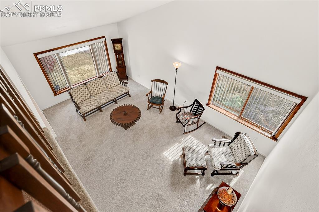 Image 19 of 37: Front living room from upper landing area