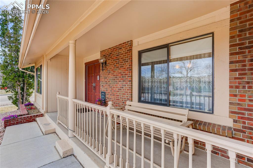 Image 4 of 37: Welcoming front porch!