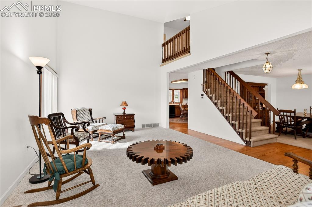 Image 6 of 37: Living room has new carpet and fresh interior paint!
