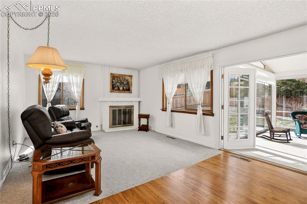 Image 8 of 37: Family room with fireplace!