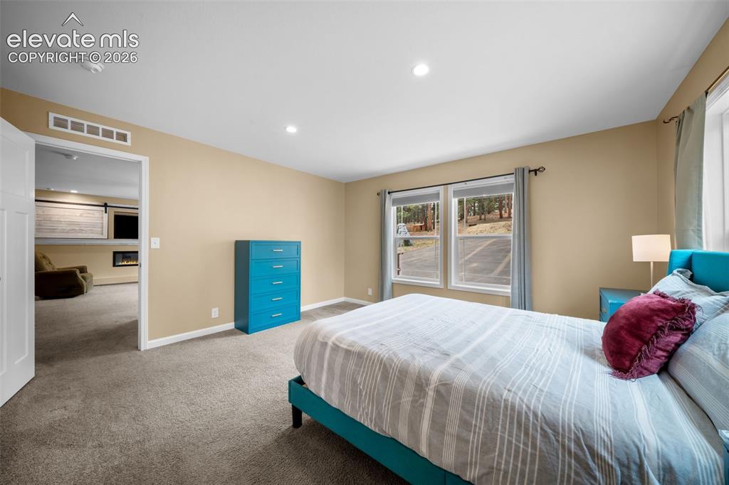 Image 22 of 49: Master Bedroom