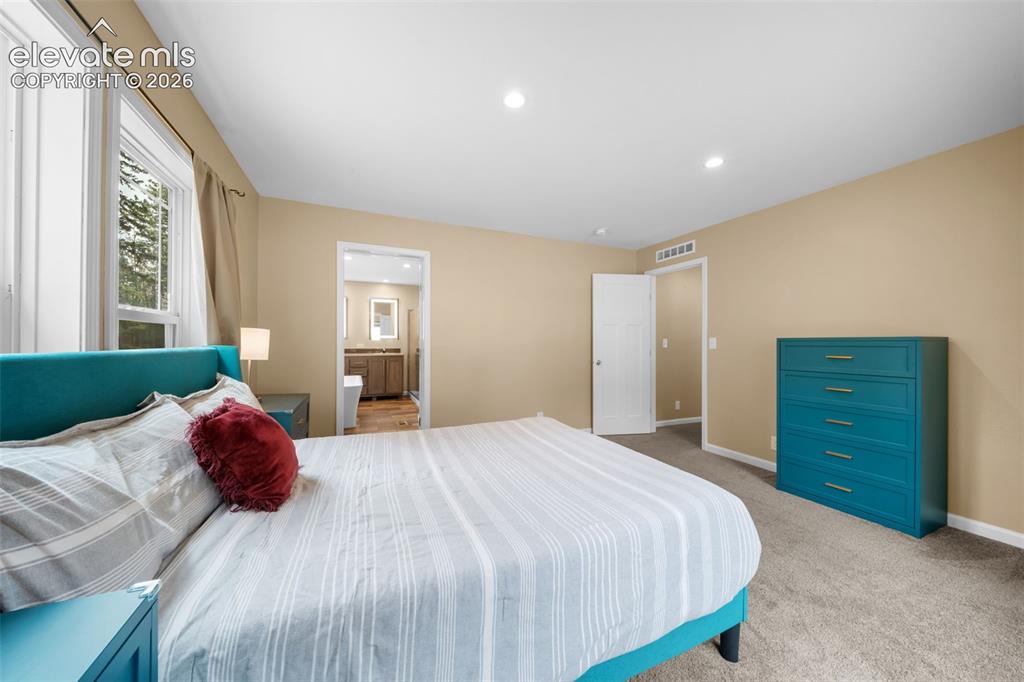Image 23 of 49: Master Bedroom