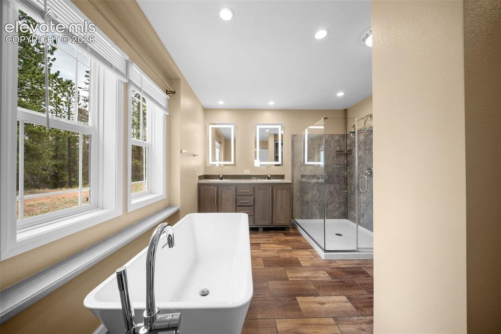 Image 24 of 49: Master Bathroom