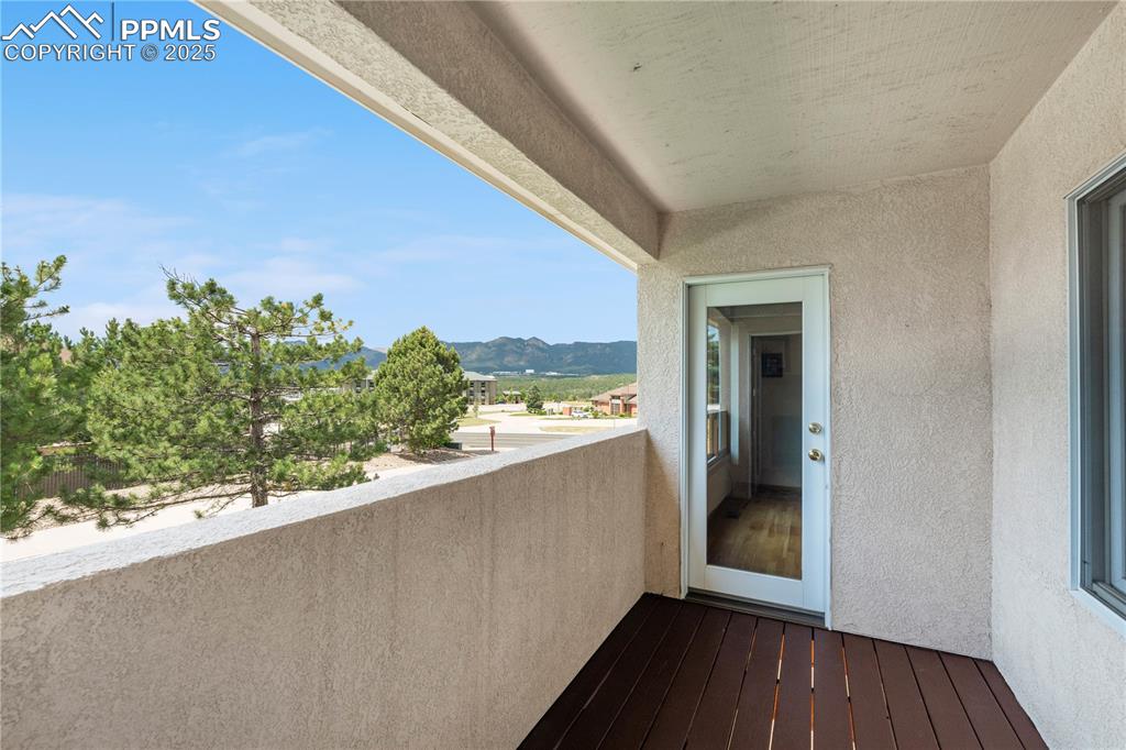 Image 19 of 49: Balcony featuring a mountain view