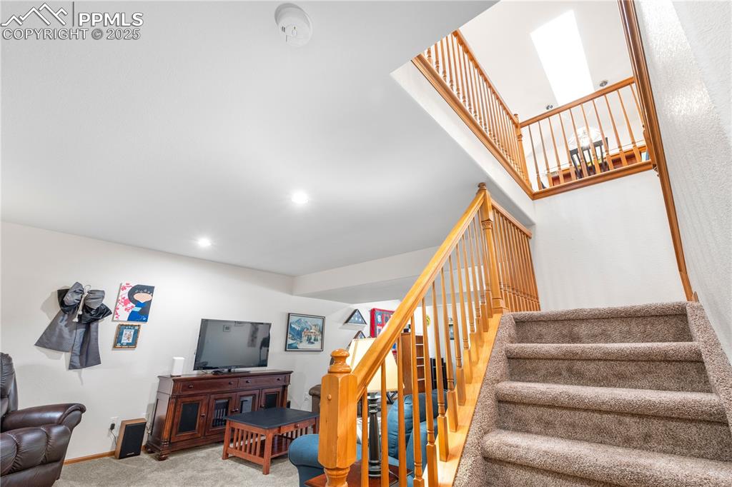 Image 29 of 49: Staircase featuring carpet and recessed lighting