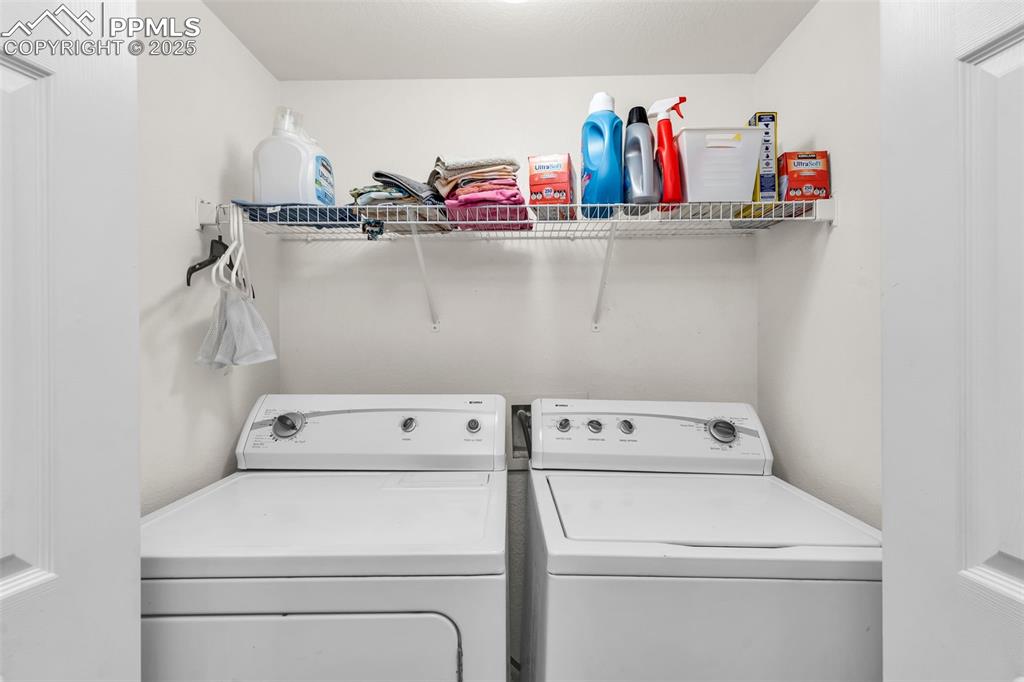 Image 8 of 20: Laundry room with washer and dryer