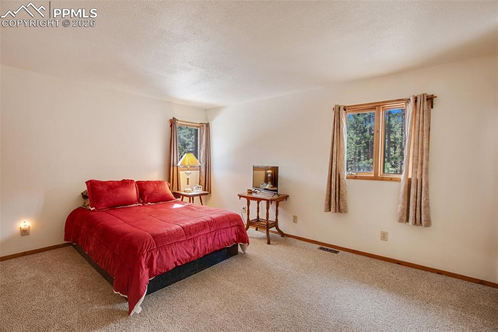 Image 16 of 28: Master Bedroom