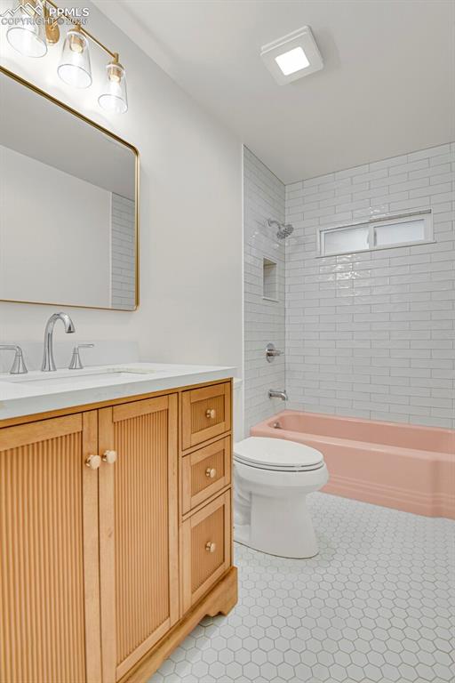 Image 32 of 40: Remodeled bathroom