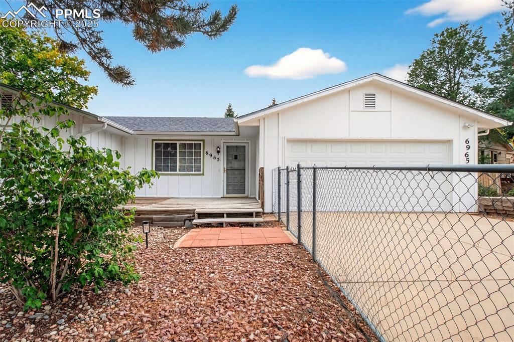 Image 13 of 37: Ranch-style house with 2 car garage
