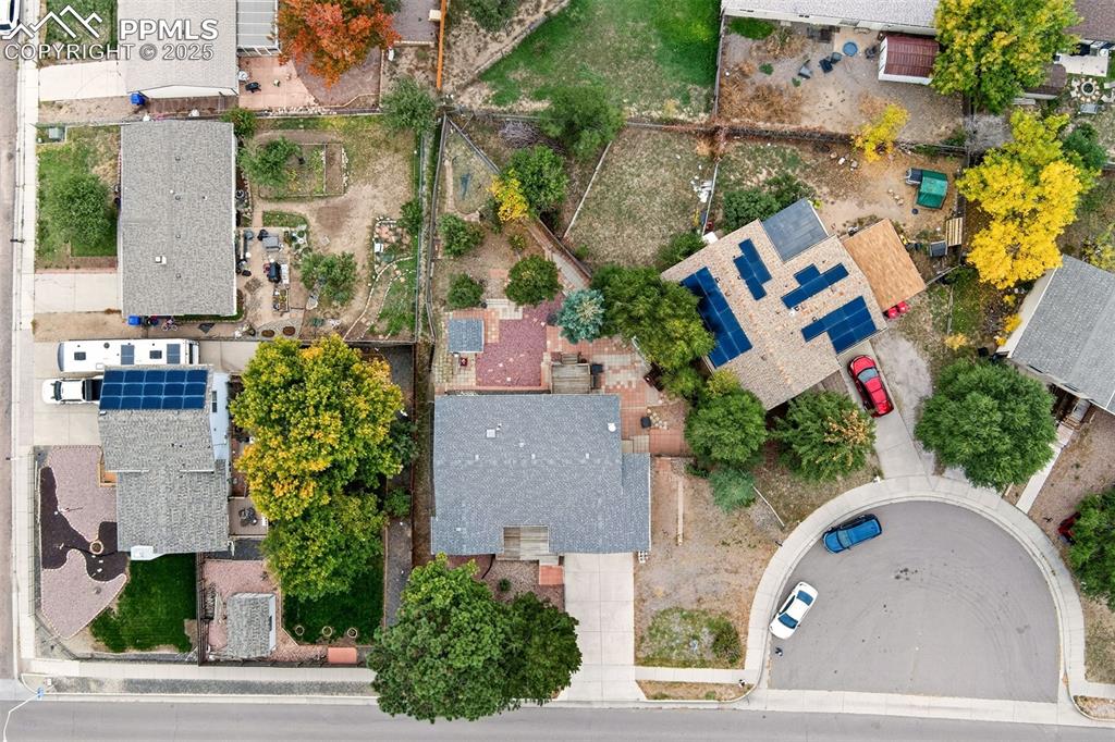 Image 15 of 37: Aerial view of property and surrounding area