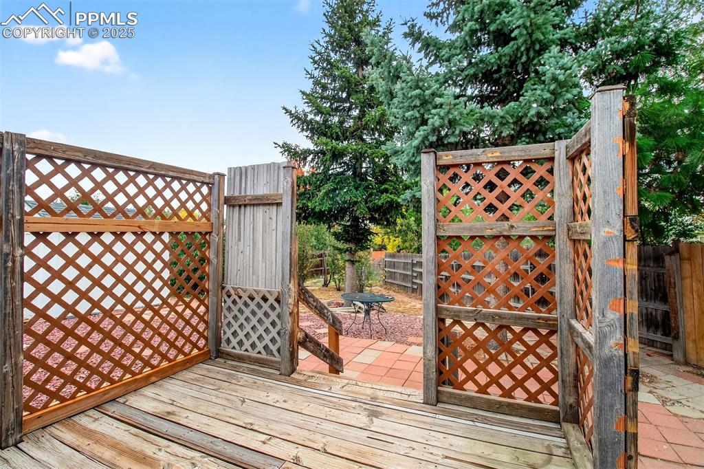 Image 22 of 37: Rear deck off kitchen