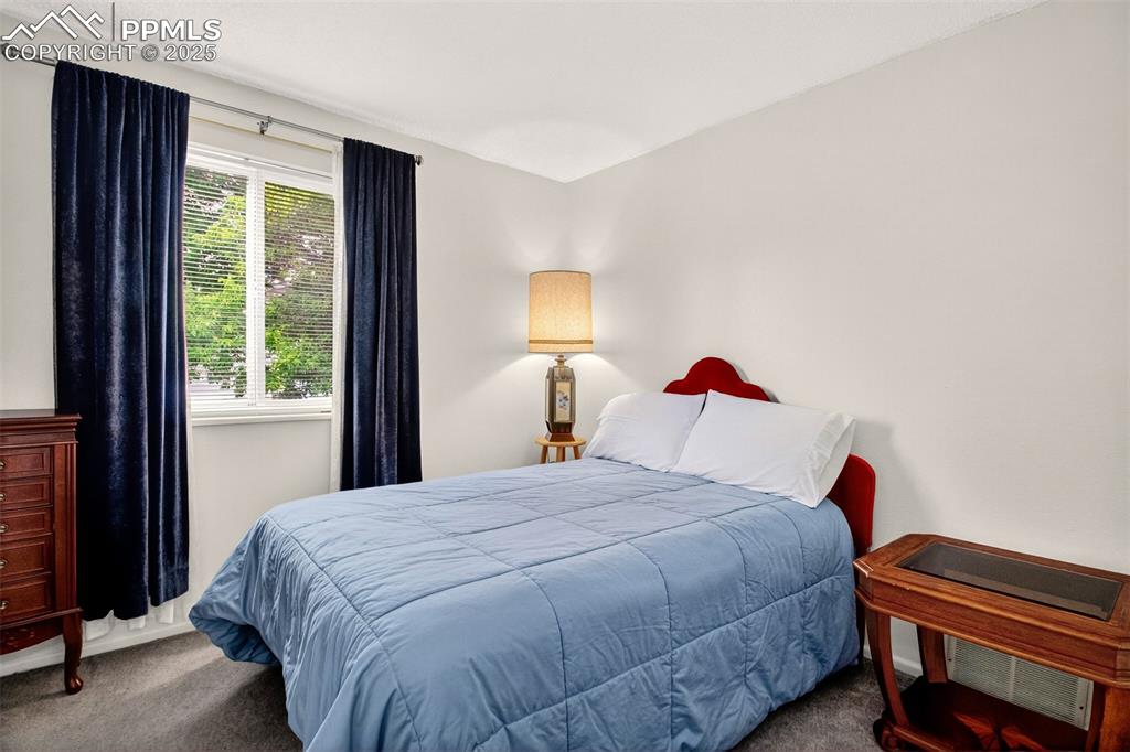 Image 8 of 37: View of carpeted bedroom