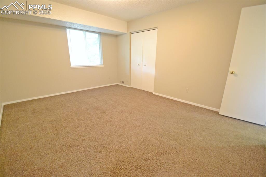 Image 14 of 27: Master Bedroom