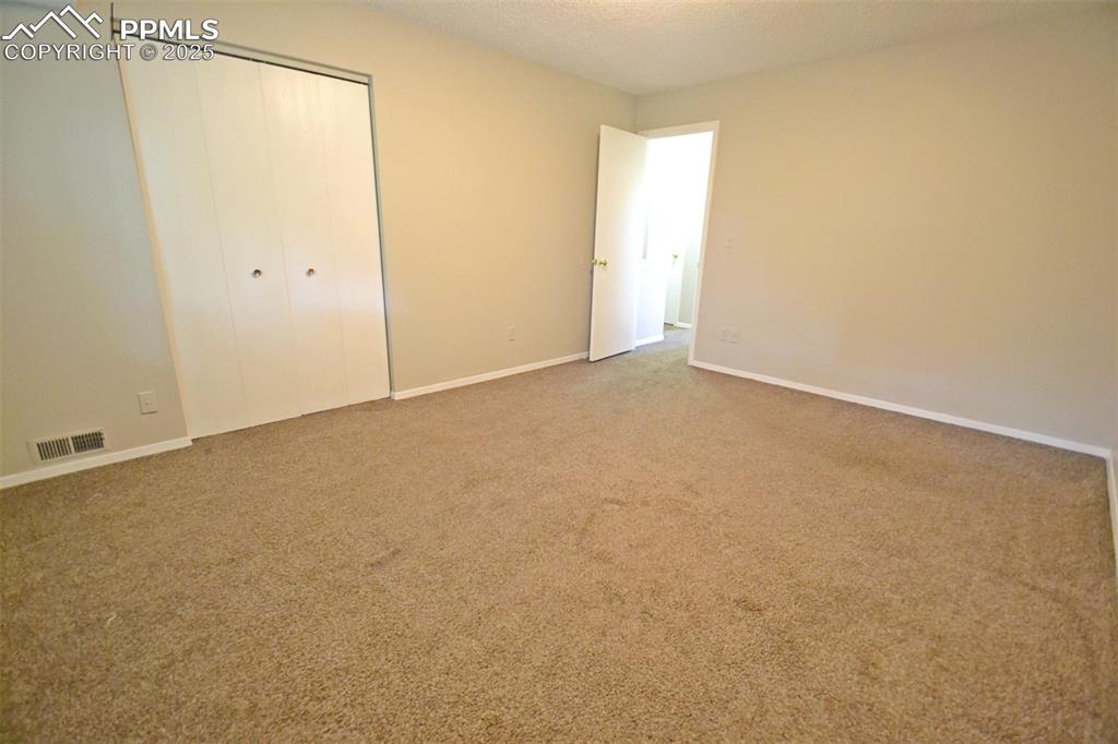 Image 15 of 27: Master Bedroom