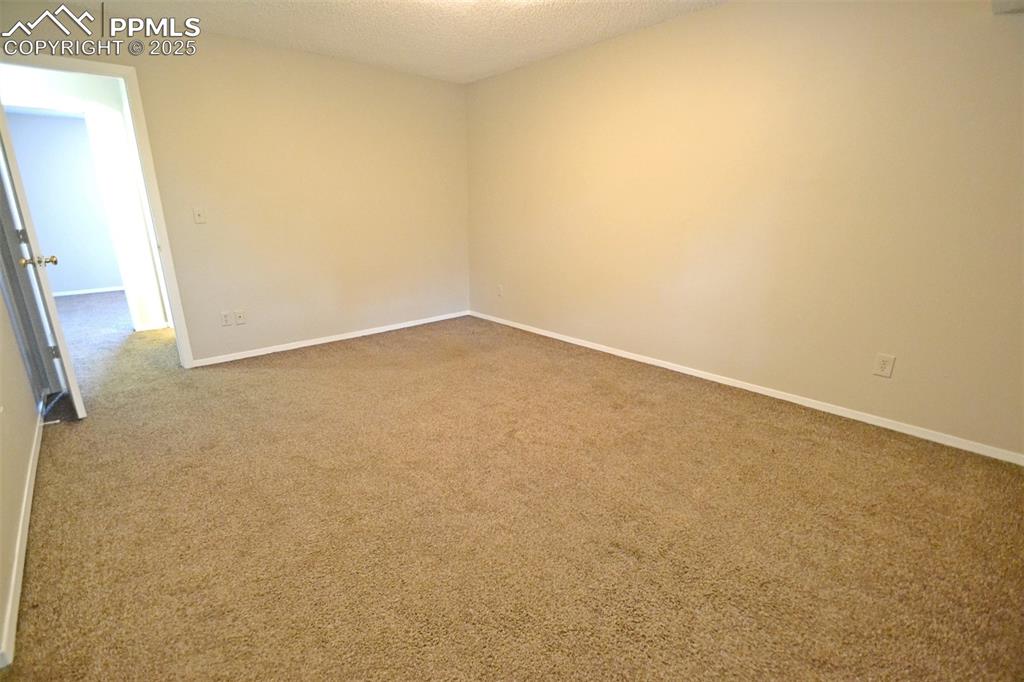Image 16 of 27: Master Bedroom