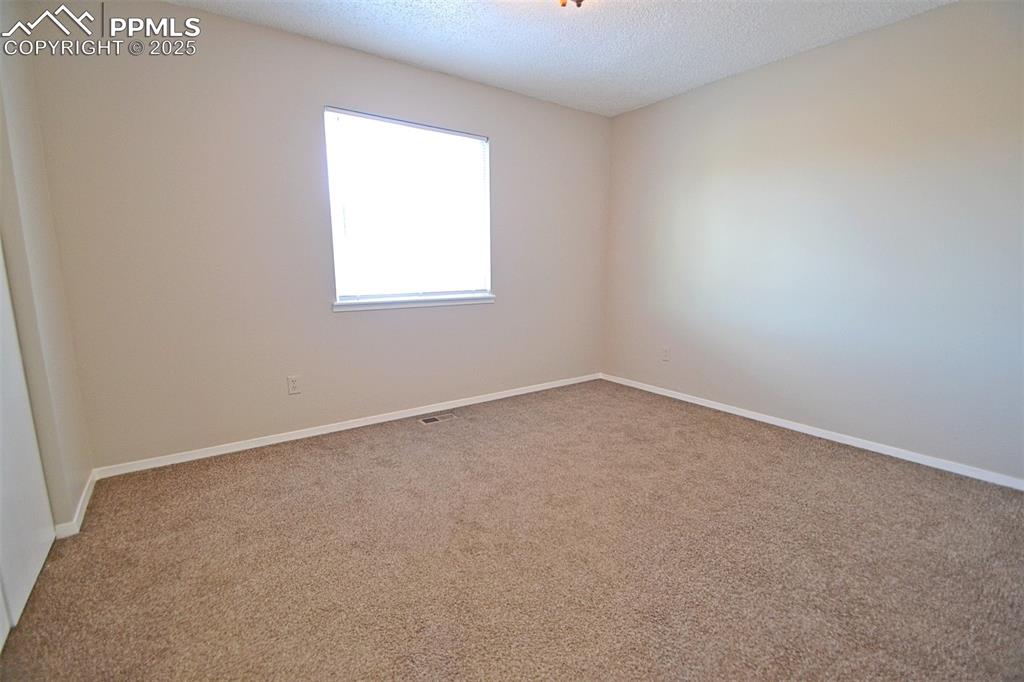Image 20 of 27: Bedroom