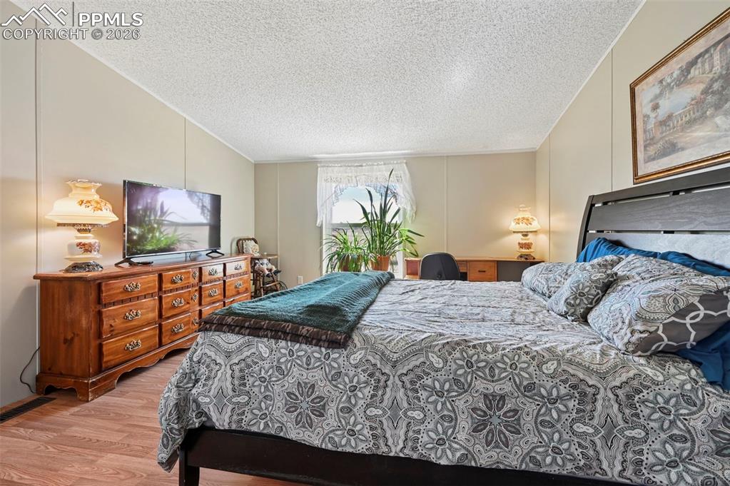 Image 13 of 47: Primary Bedroom with attached Bathroom and walk in closet