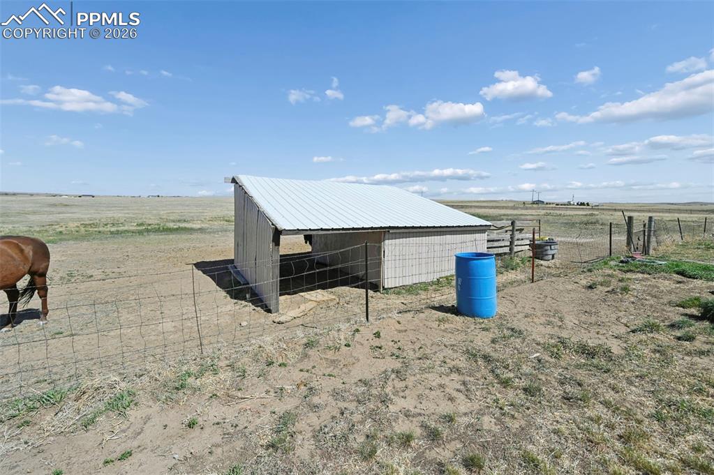 Image 33 of 47: View of Back Yard and Chicken Run