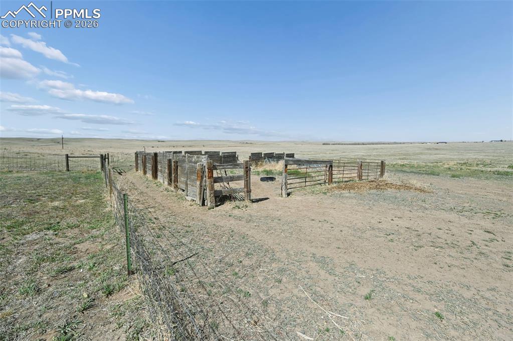 Image 35 of 47: Loafing Shed and fenced pasture