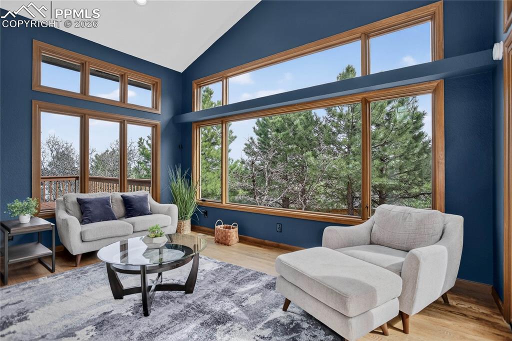 Image 10 of 42: Living room w/ walk-out