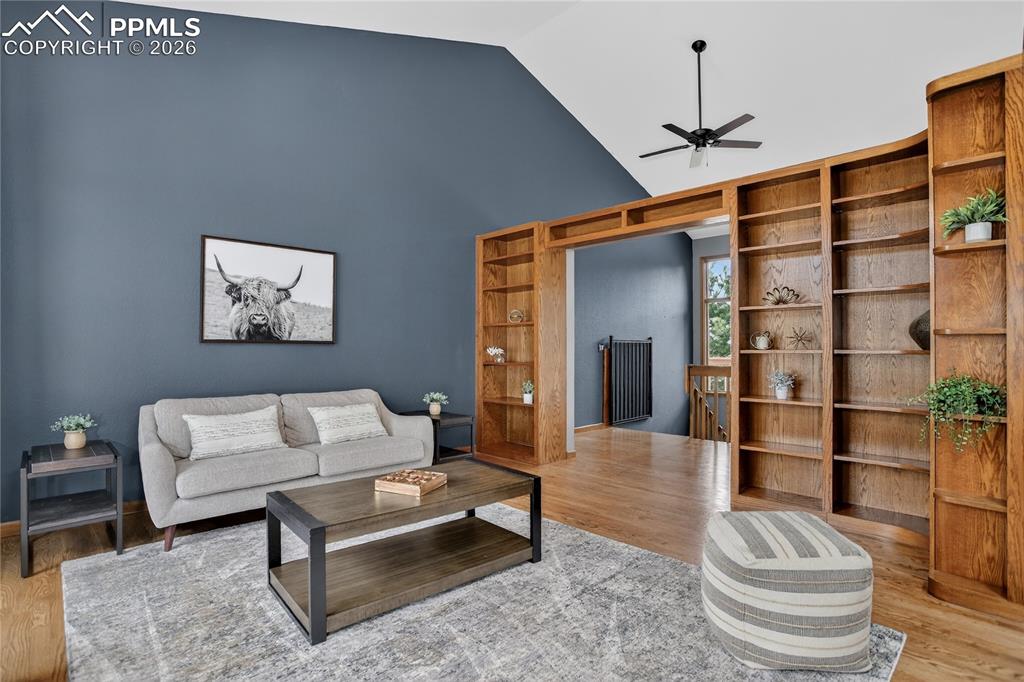 Image 4 of 42: Front living room w/ built-ins