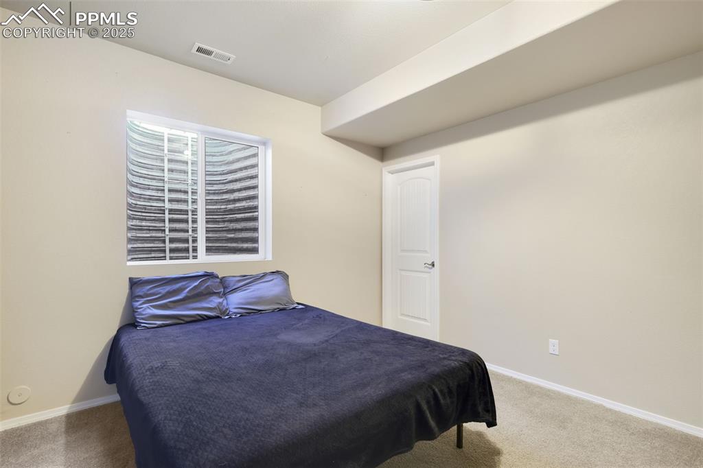 Image 31 of 39: Bedroom