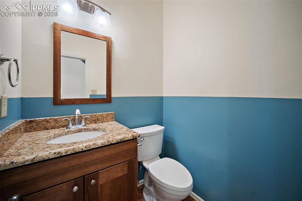 Image 5 of 31: Bathroom with vanity and toilet