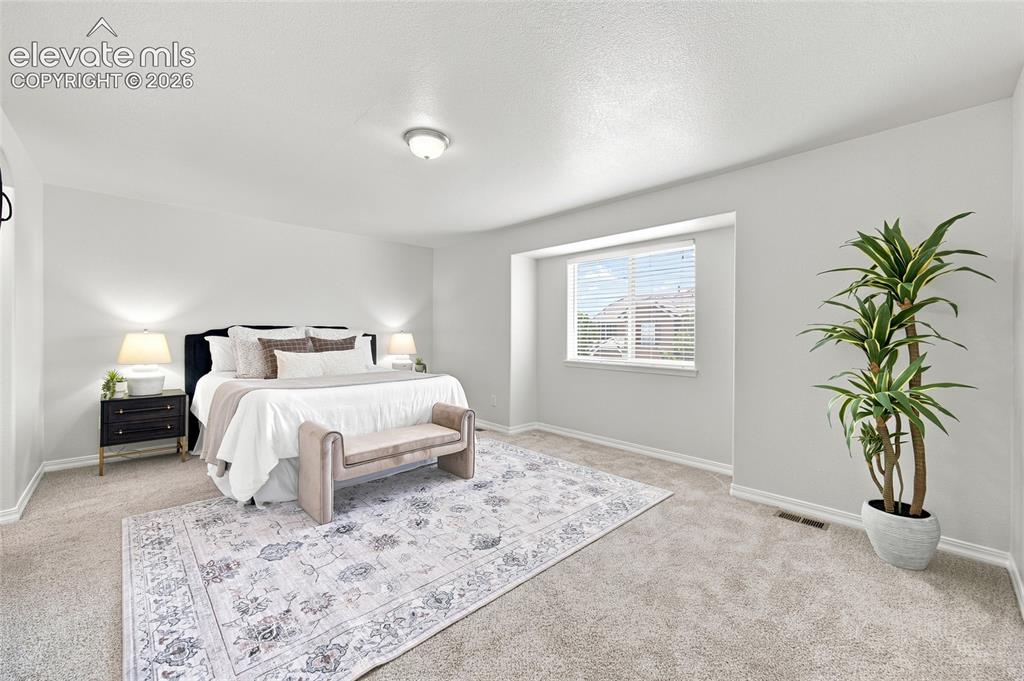 Image 23 of 47: Master Bedroom