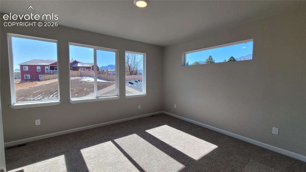 Image 10 of 25: Upper Level with natural light through the windows at the stairs!