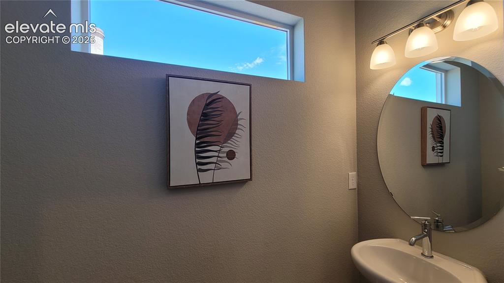 Image 17 of 41: Powder Room, located on the main level!