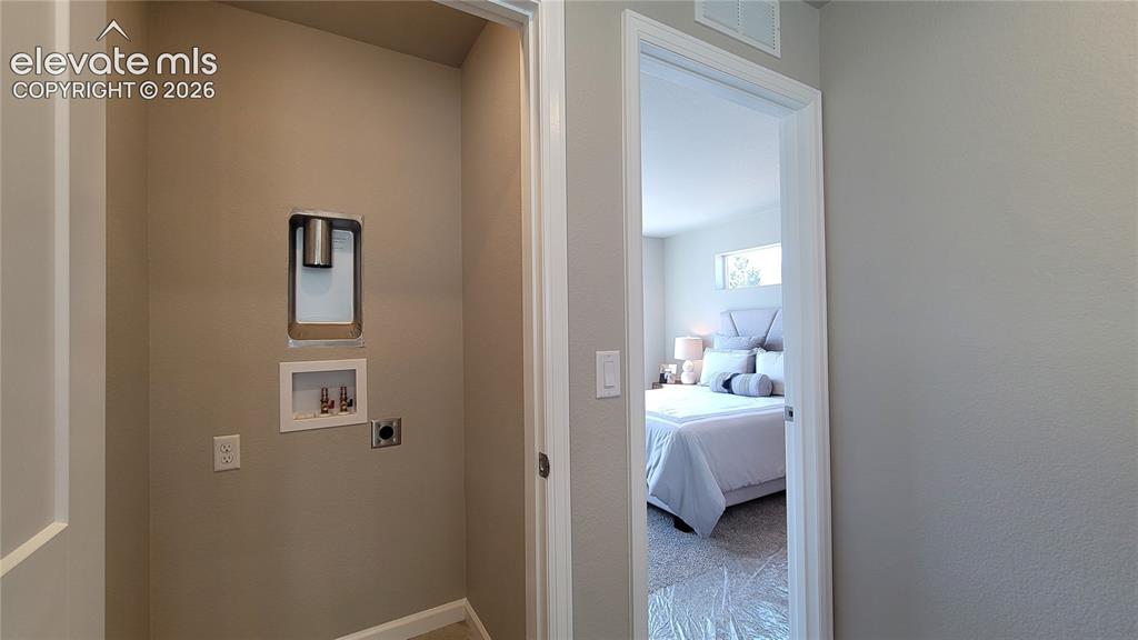 Image 33 of 41: Stackable Laundry Closet! 