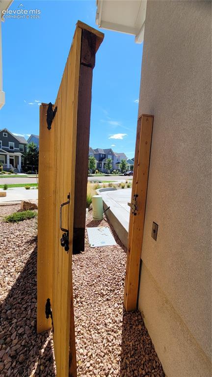 Image 39 of 41: Gate to garage and driveway!