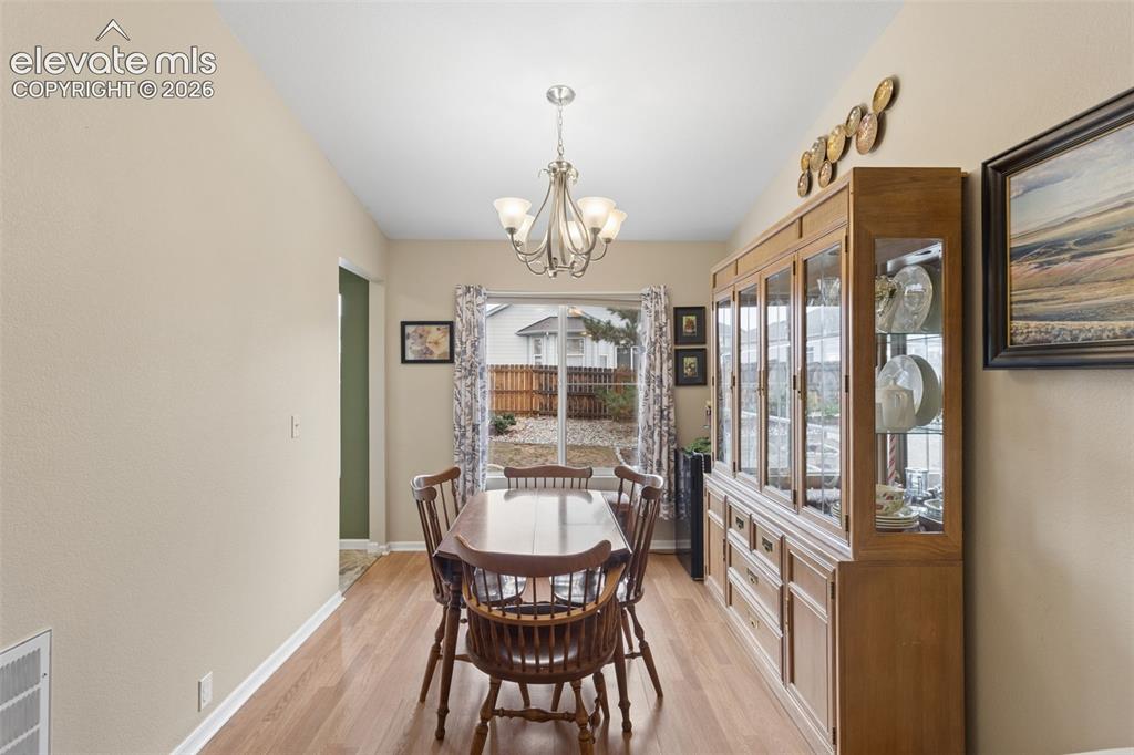 Image 9 of 32: Wood-finish flooring throughout