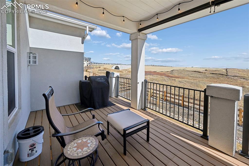 Image 17 of 49: Wooden deck with grilling area