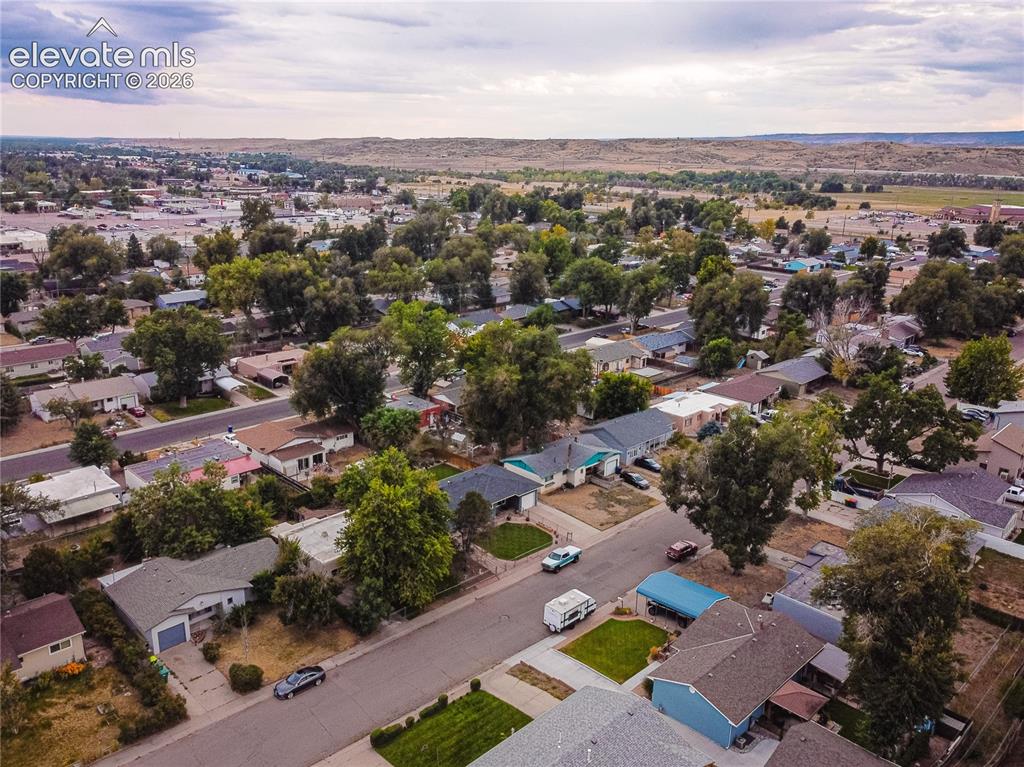 Image 42 of 44: Residential neighborhood with mature trees