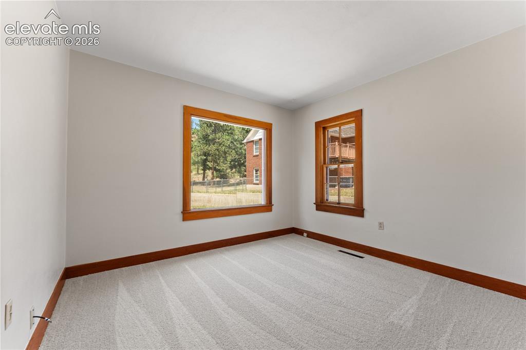 Image 18 of 39: Main level Bedroom