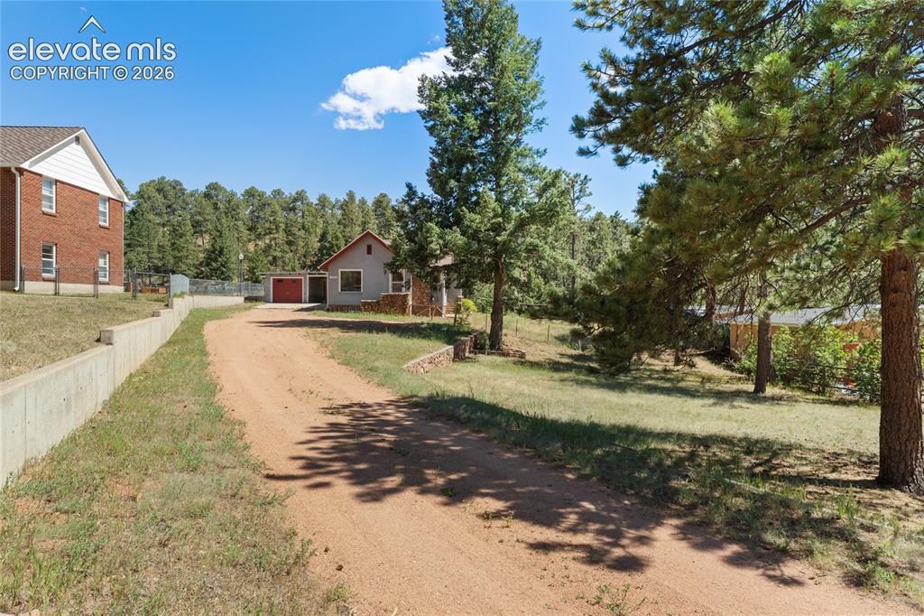 Image 2 of 39: you can see the long driveway with plenty of room
