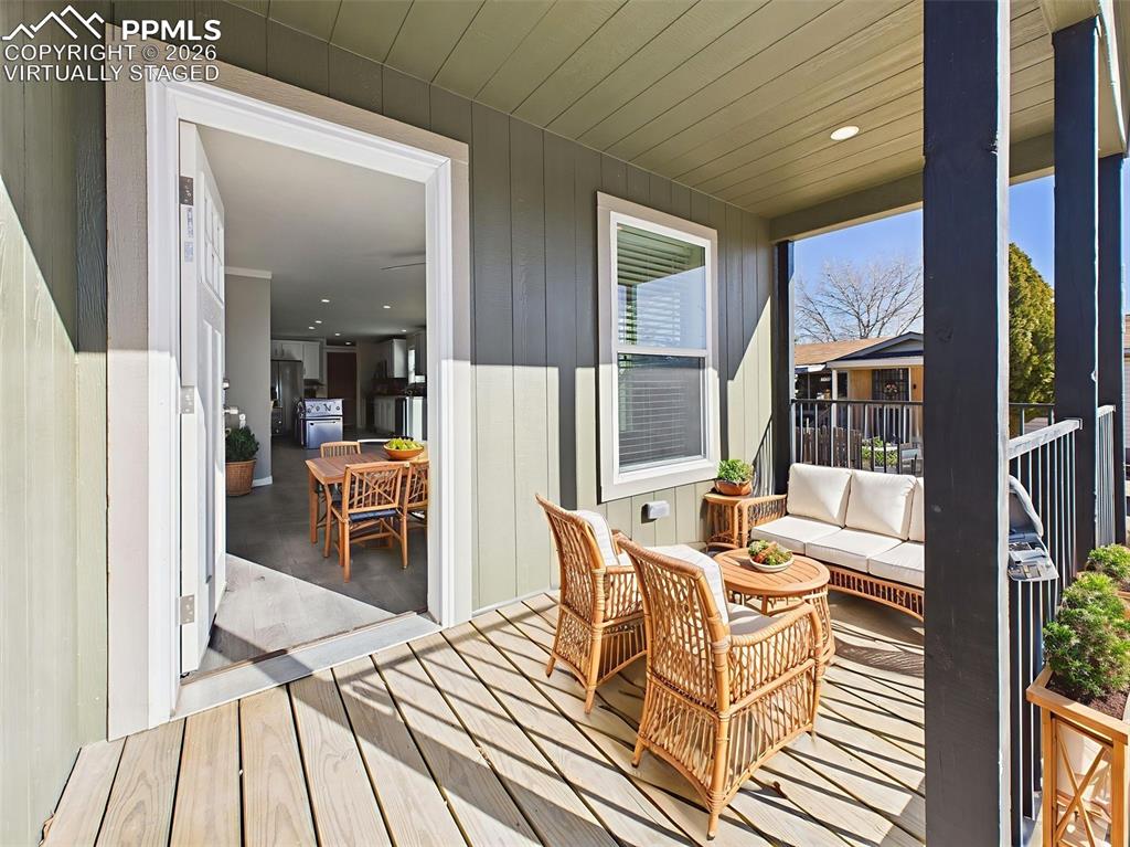 Image 3 of 50: Virtually Staged Front Porch – Imagine peaceful mornings or casual gatherin