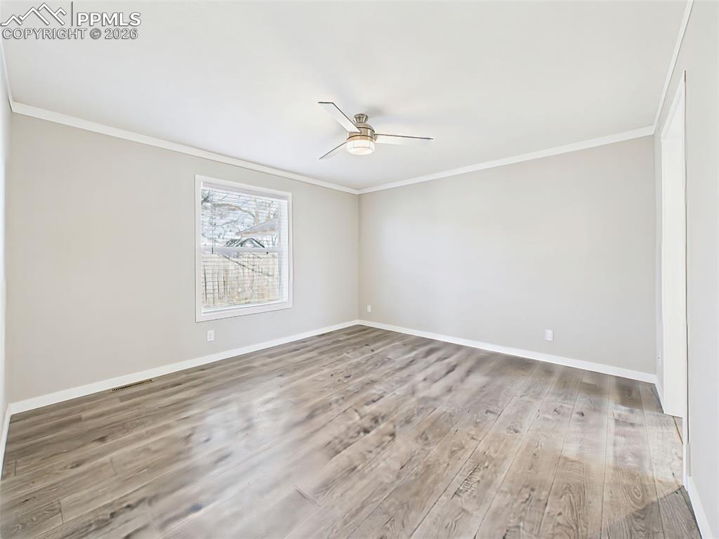 Image 31 of 50: Primary Bedroom (Unstaged) – The oversized layout offers excellent flexibil