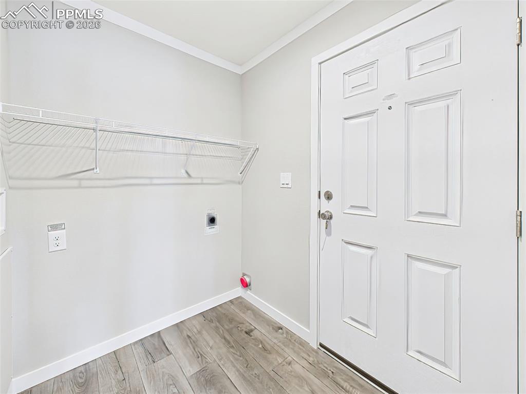 Image 41 of 50: Laundry Room / Mudroom Entry – A bright and functional space with washer/dr