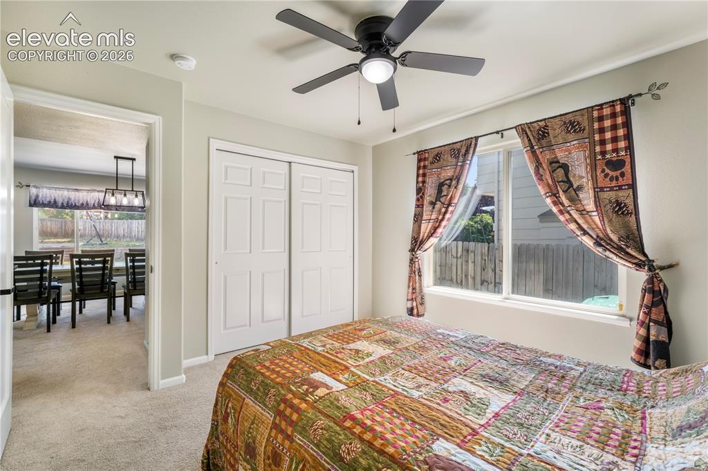 Image 19 of 50: Main level 1st bedroom off of family room