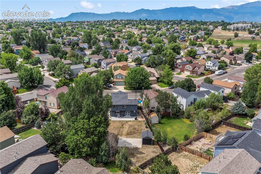 Image 5 of 50: Aerial view of backyard on large lot