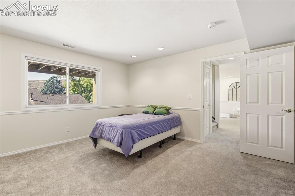 Image 28 of 49: Bedroom