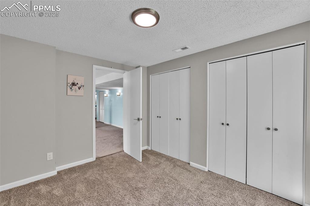 Image 32 of 39: Bedroom