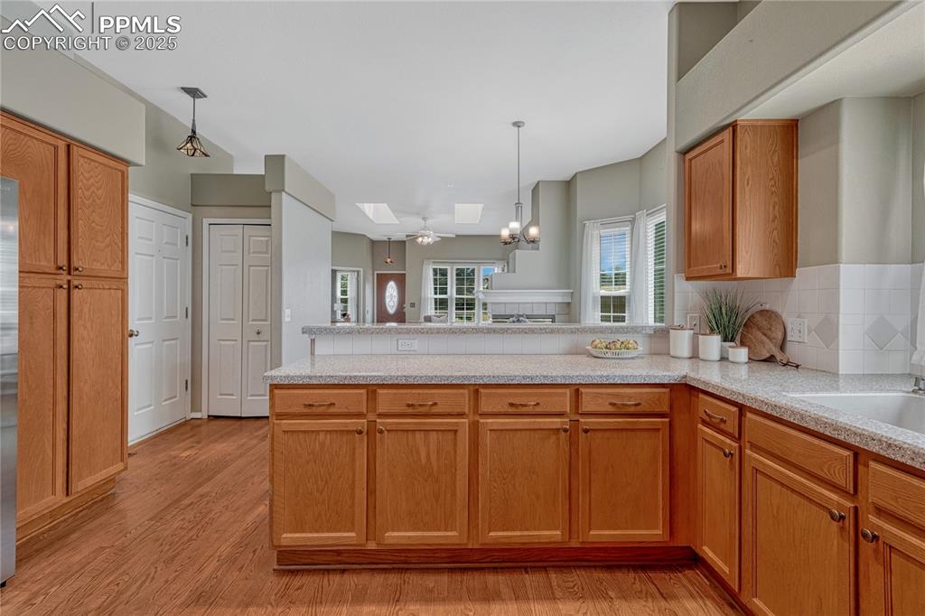 Image 21 of 47: View from kitchen into dining area and living room, this is a great floor p