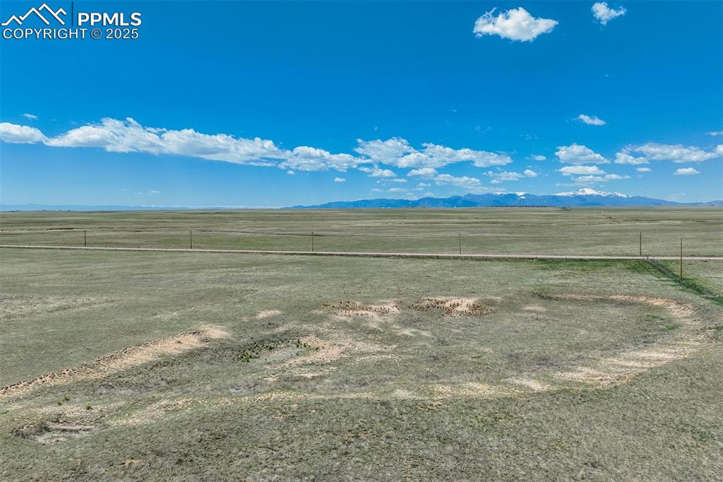 Image 17 of 20: View of mountain background featuring rural landscape