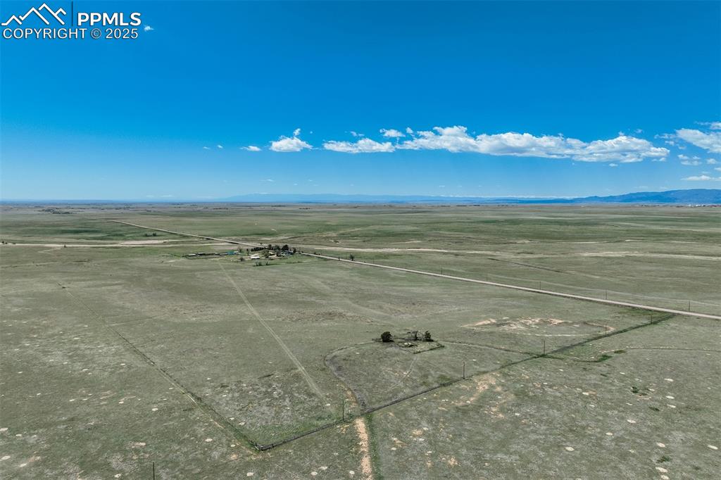 Image 3 of 20: View of rural area with mountains