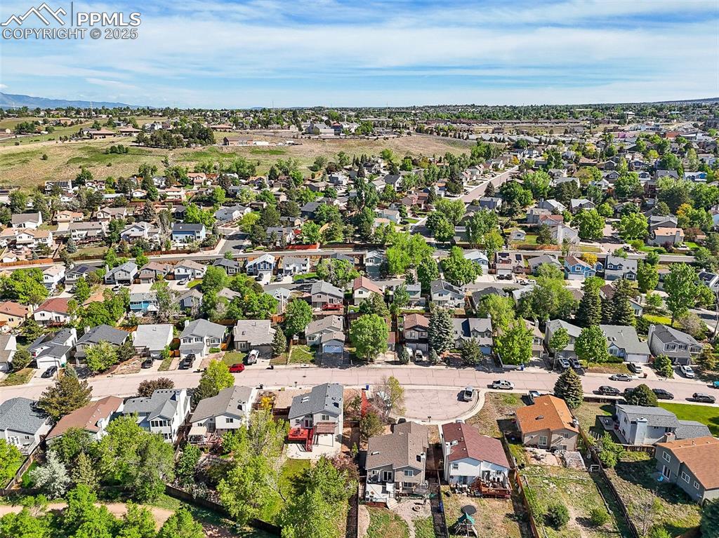 Image 42 of 47: View of property location featuring nearby suburban area